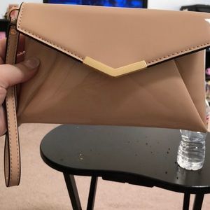 Beige, glossy wristlet